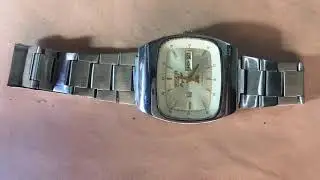 Restoration of a rusty Ricoh Automatic watch.