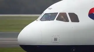 Airplane Pilots double waves Streamer after landing