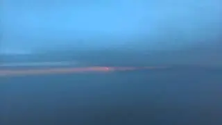 Sunset flight from Bangkok to Singapore.