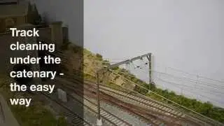 Easy model railway track cleaning under catenary wires