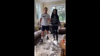 Husband helps his wife to walk again