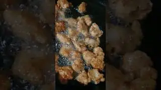 Red chili souce rice with bonles cubes fried,