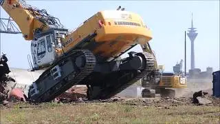 Liebherr excavator 974 demolition site oil-tanks