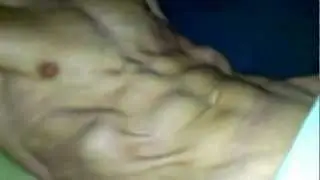 Hot sixpack abs & upper body muscle closeup flexing
