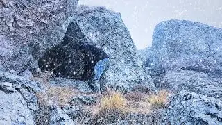 Caught in snow and blizzard/Building a safe shelter in the mountains/Surviving a cold winter night.