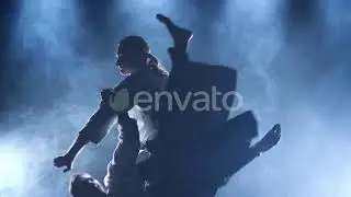Fight Between Two Aikido Fighters in Dark Studio with Smoke and Lighting. Slow Motion. Close Up....