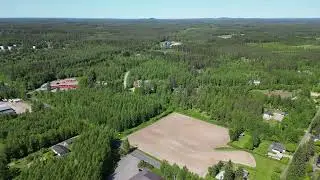 Flying over the Kalaton citypart in Outokumpu, Eastern Finland 10.6.23
