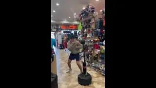 Ryan Garcia hitting the Reflex Bag in Pro Boxing Supplies Store