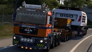 Transporting the 128 tons through the night with the MAN F2000
