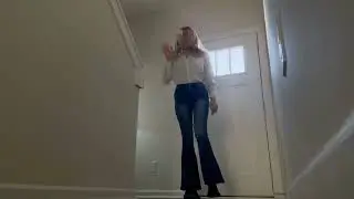 Woman takes her shoes and socks off while babysitting