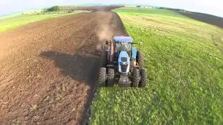 Ploughing with New Holland T8040