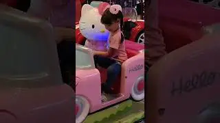 Karina rides a car