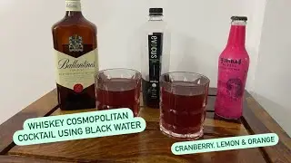Whiskey Cosmopolitan Cocktail using Black Water | Cranberry, Lemon & Orange | Get Tipsy 🥃