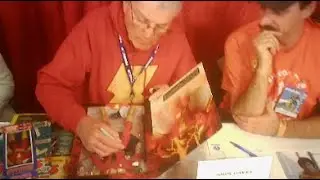 Shazam's John Davey signing autographs.