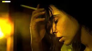 Carmen Tinoco smoking cigarette 🚬