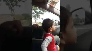Small baby shaking his body on music and increasing the volume