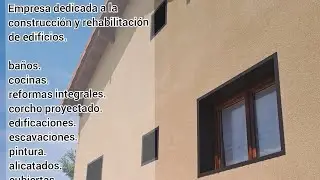 Aplicación de corcho proyectado en fachada