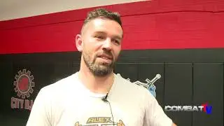 Head wrestling coach at City Kickboxing Andre Paulet gives thumbs up.