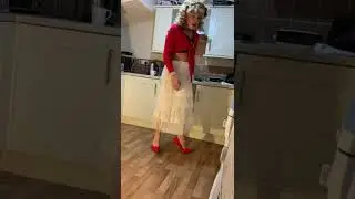 Crossdresser diva tries on a skirt