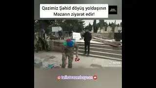 Lənkərandan olan Qazimiz Şəhid yoldaşının məzarı üstündə.