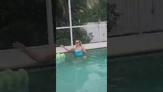 My Wife swimming in the pool during Hurricane Debbie