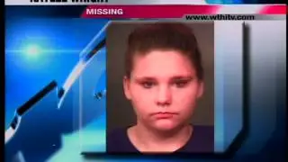Woman turns herself in to police