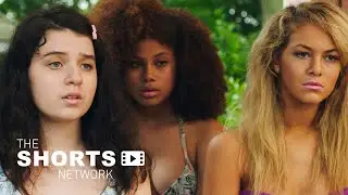 Teenage girls compete for power at a community swimming pool. | Short Film 