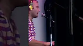 Phil Collins performing 