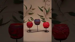 Aboriginal Candle Holders by Kathleen Buzzacott