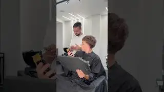 He's cutting his own hair BY HIMSELF! 