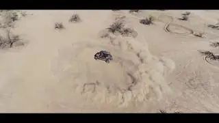 RAZER RIDING IN THE DUNES OF ARIZONA