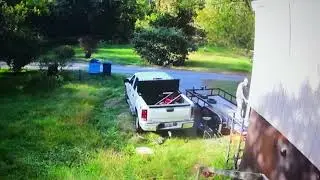 Trailer Moves Forward While Man Tries to Load it With GoodsTrailer Moves Forward While Man Tries to
