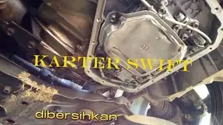 pembersihan Transmisi Suzuki Swift bagian Bawah