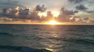 A beautiful and powerful sunrise in Tulum Mexico by a Tulum photographer
