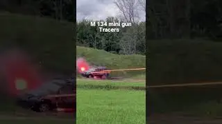 M 134 MINI GUN SHOOTING TRACERS IN TO CAR         