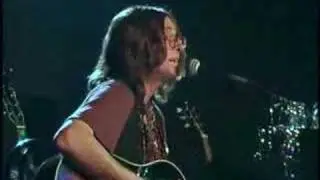 Mark Staycer as John Lennon