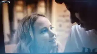 boy sitting in girlfriend lap 