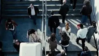 Birds eye view dolly slow motion people walk steps from / to underground entrance.100-25p super slom