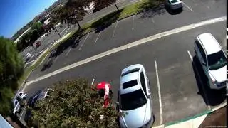 Car runs red light and causes accident