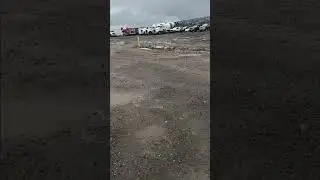 clearing out a clogged ditch at work