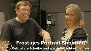 Winterportraits hinter einer eisigen Glasscheibe im Studio