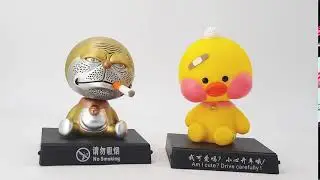 Gold Doraemon Shaking Head Car Toy