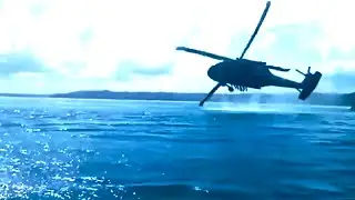 Helicopter blades Kiss the Water Surface during a training maneuver