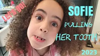 Sofie pulling out her own tooth@thisisbig-O