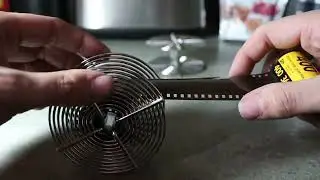 Loading a Hewes steel 35mm film reel
