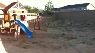 Girls in sprinkler