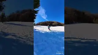 Alina is learning to ride snowboard
