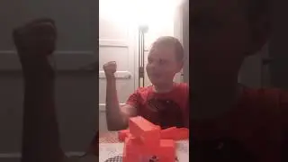 Playing jenga in a video