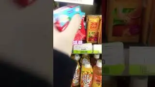 Buying anything as long as it's at least $1 in a Korean convenience store in Mongolia