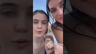 We are chatting in the pool wearing pink and blue bikinis🩱👙👭🥰🏊‍♂️👀